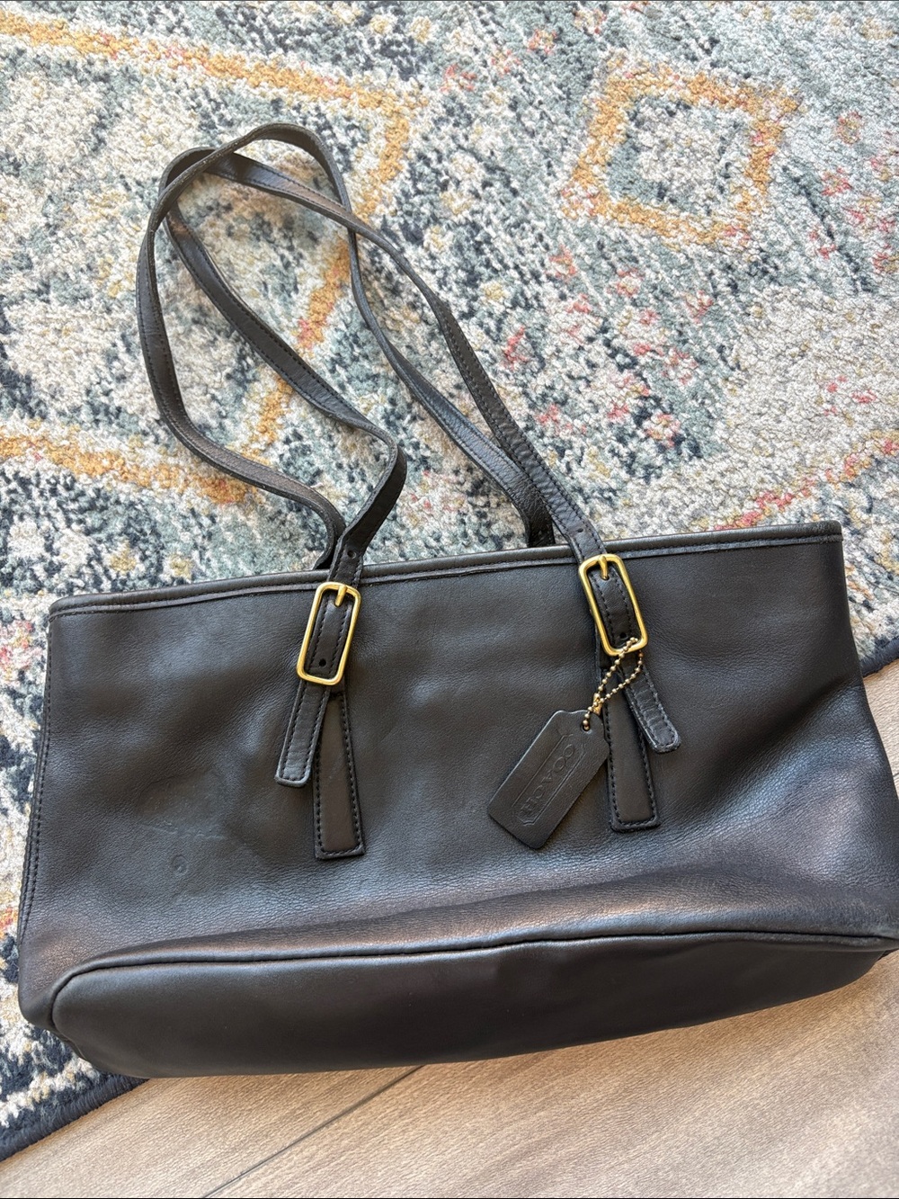 Coach Black Leather Tote with Gold Buckle Accents